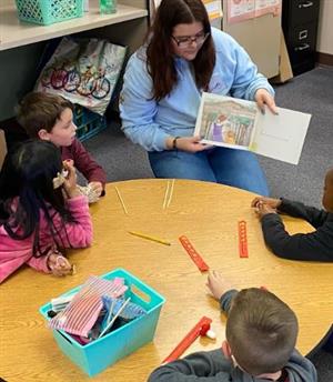 CHS student reads to first graders